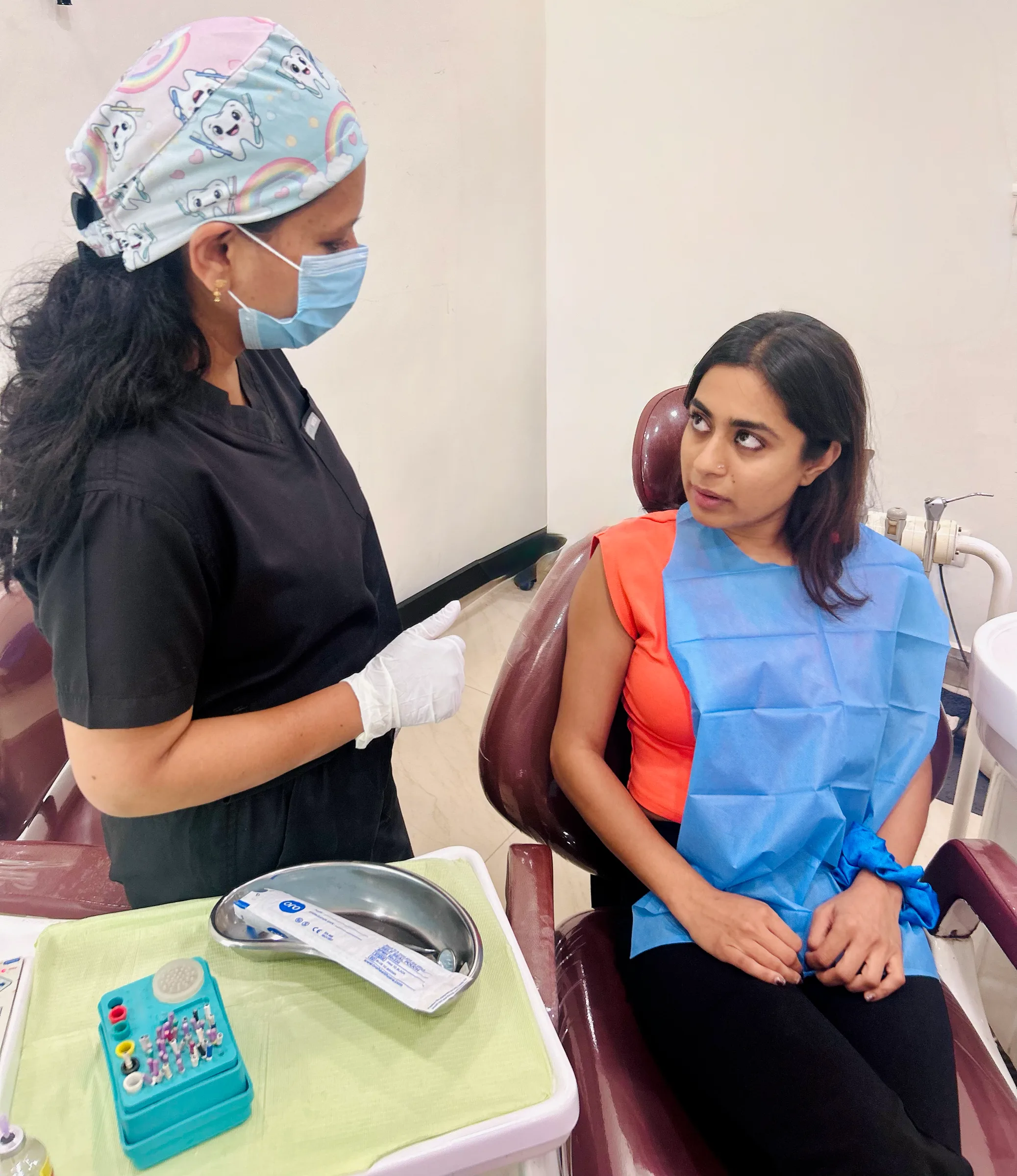 Dr. Shilpa explaining a treatment to a patient