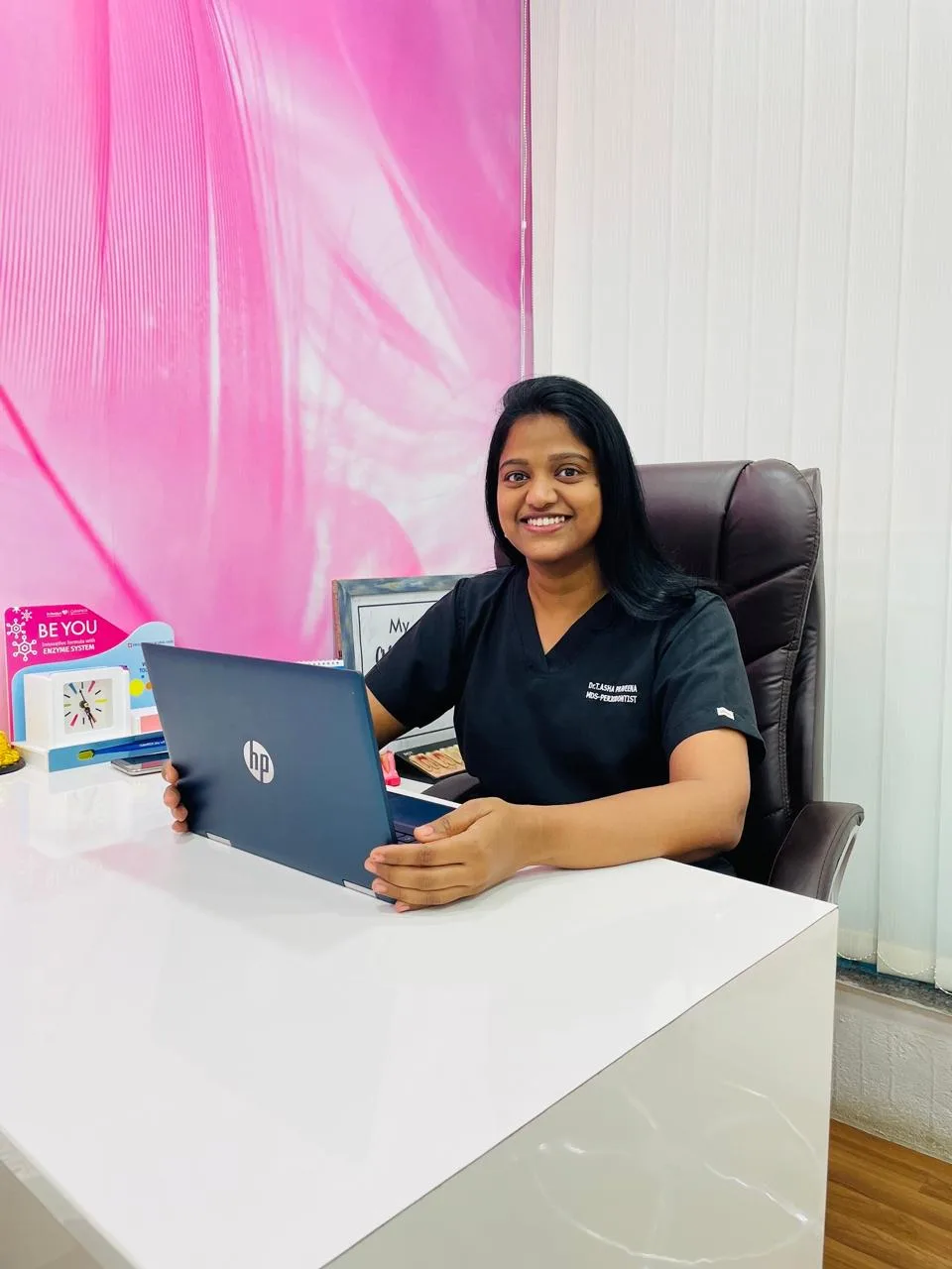 Dr. Asha Praveena, Periodontist & Implantologist at Perfect Smile Dental Clinic